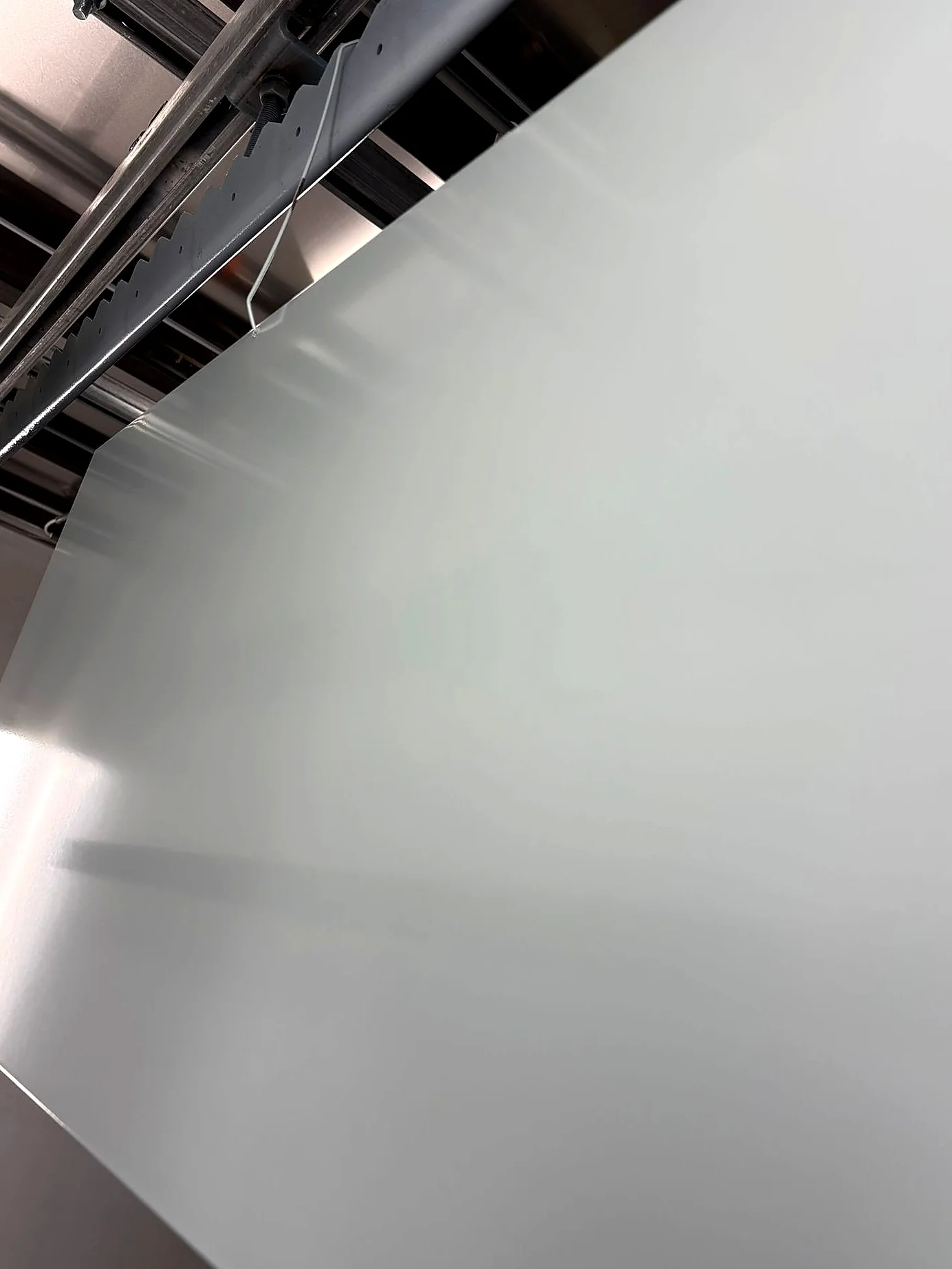 Close-up of a smooth powder coated panel surface